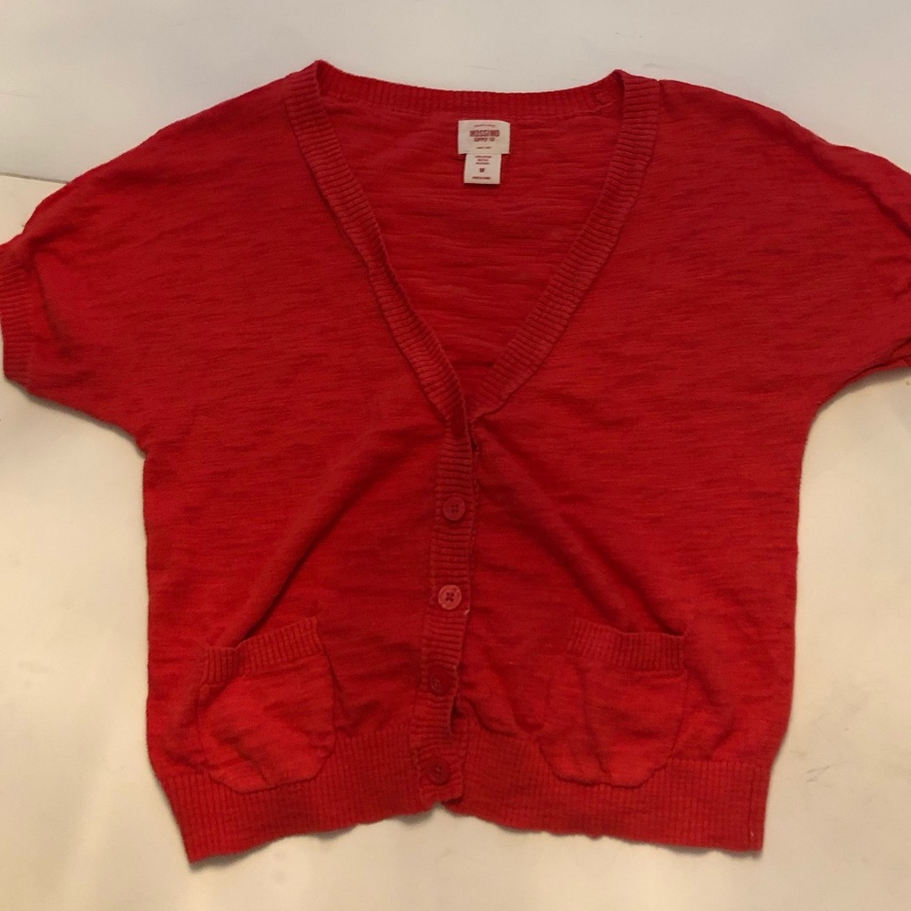 Dark coral short sleeve shrug button up sweater.